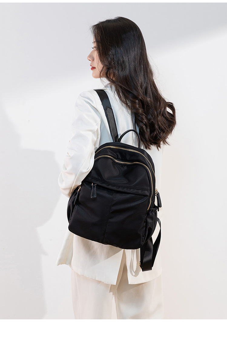 2021年新款牛津布双肩包女韩版简约时尚防盗背包大容量休闲旅行包