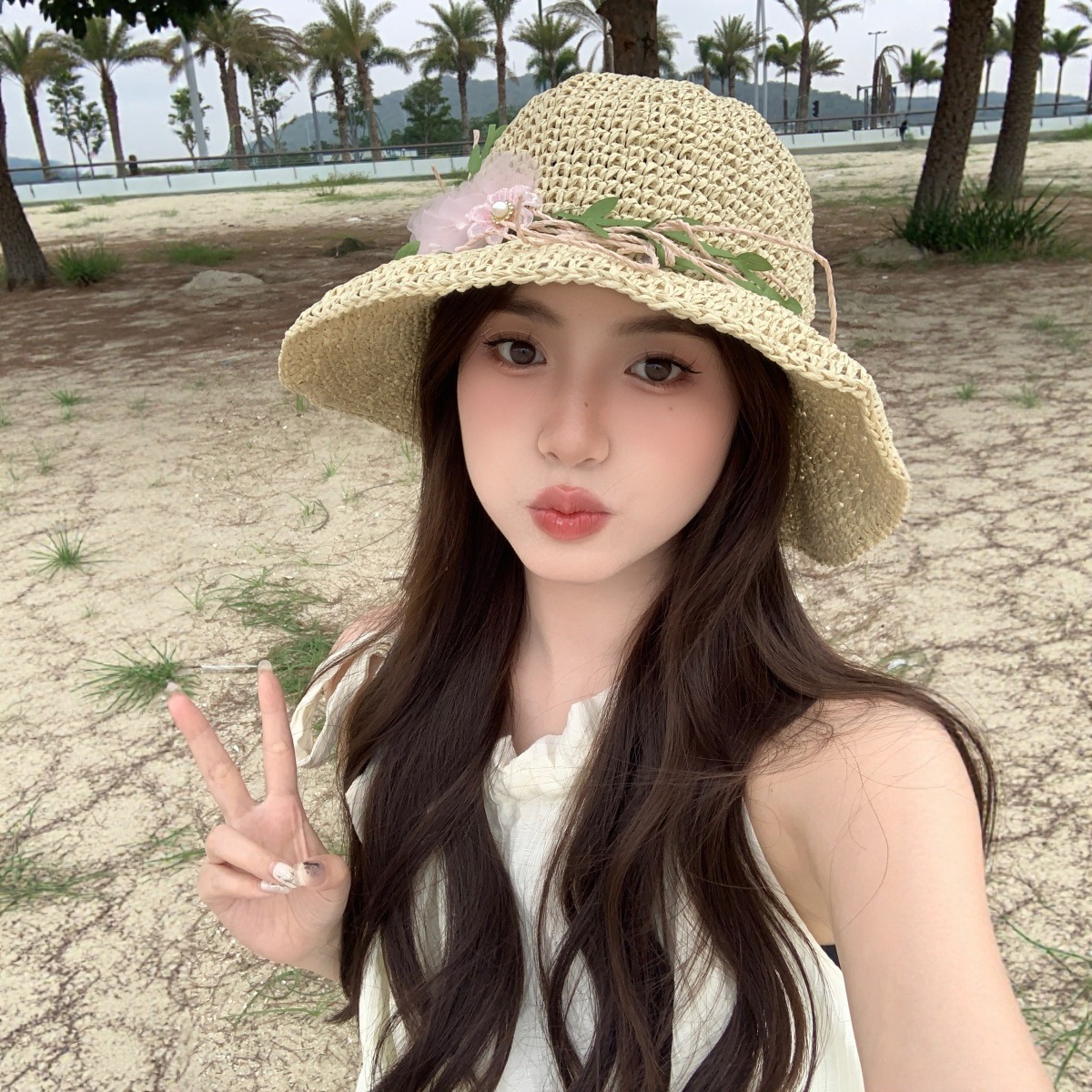 法式镂空花朵草帽女款夏新款海边度假防晒遮阳帽显脸小草编渔夫帽