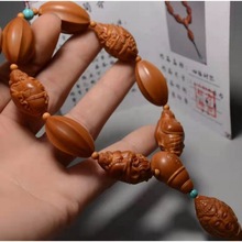 橄榄核雕刻八大弥勒笑口常开精工爆红老油核男女佛珠手串项链把件