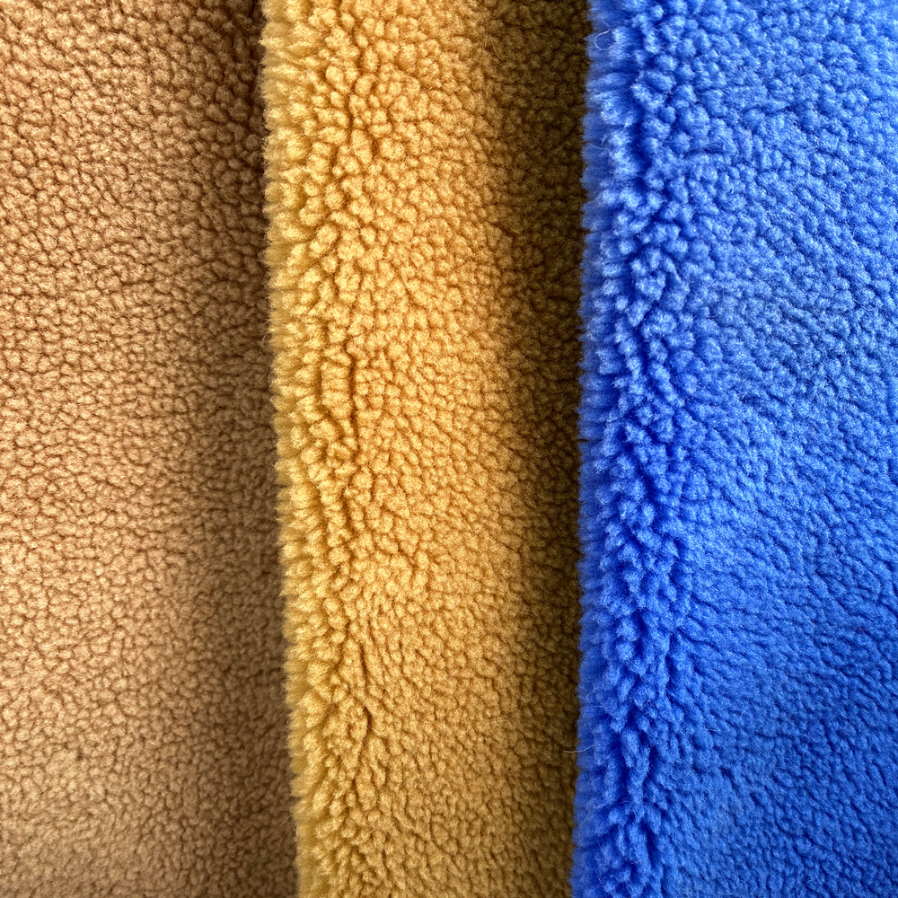 现货批发颗粒绒服装鞋材羊羔绒面料 仿三七羊毛面料 颗粒绒面料