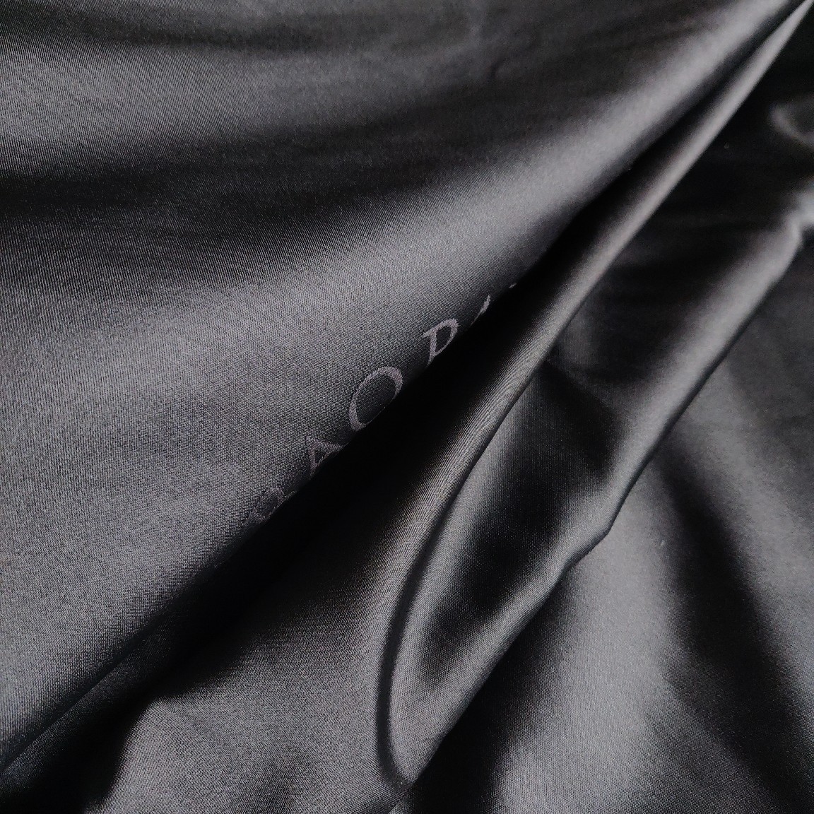 全涤提花黑色暗花面料西服工作服裤子面料类色丁可做里布光滑布料