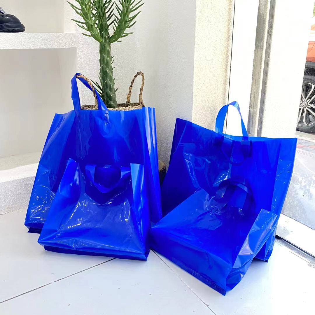 克莱因蓝网红塑料服装店手提袋子礼品包装购物袋花朵加厚手拎好看