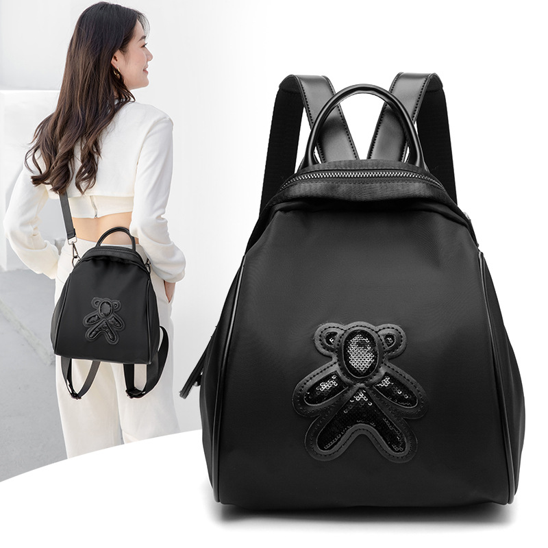 多功能双肩包女2024新款防水牛津布小熊背包时尚休闲背