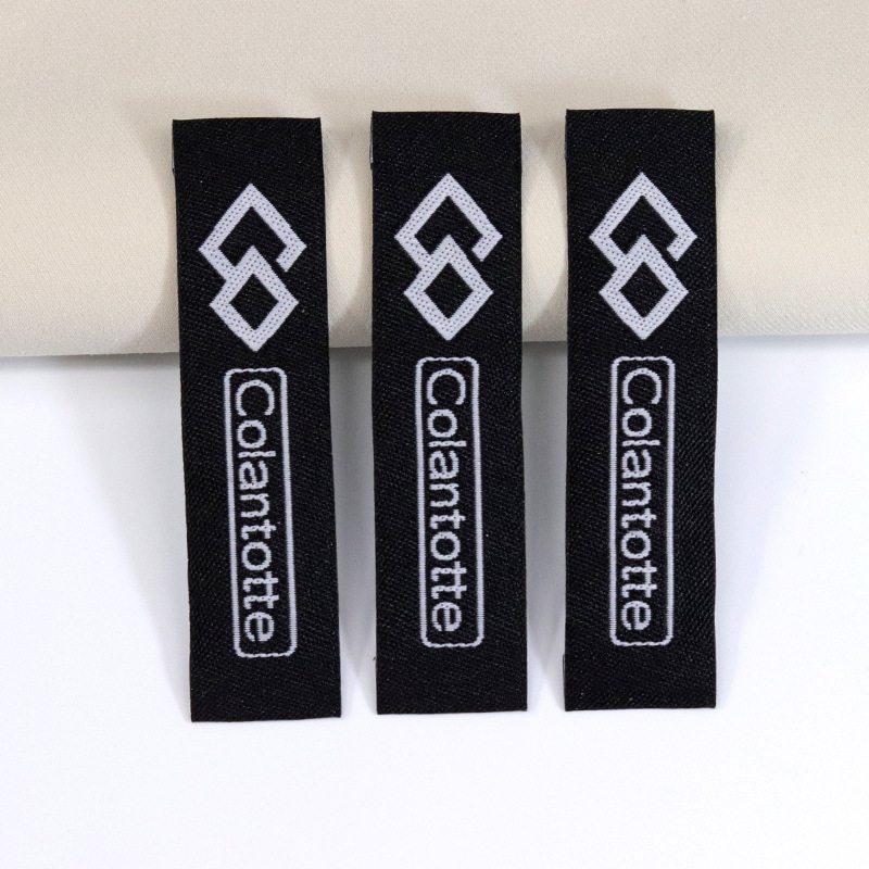 Apparel Woven Label Customized High-Density Black Background White Word Fold Collar Lable Main Label Mark Customized Logo Cloth Label