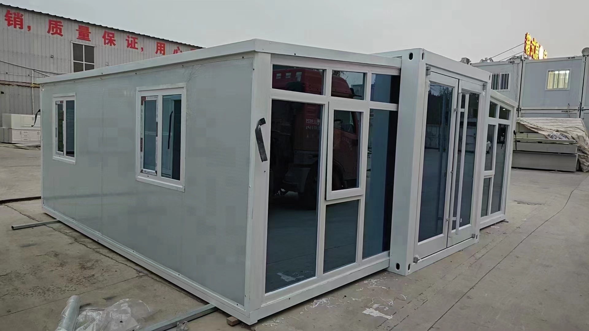 出口20英尺双翼拓展箱可住人集装箱移动房户外临时双翼折叠房