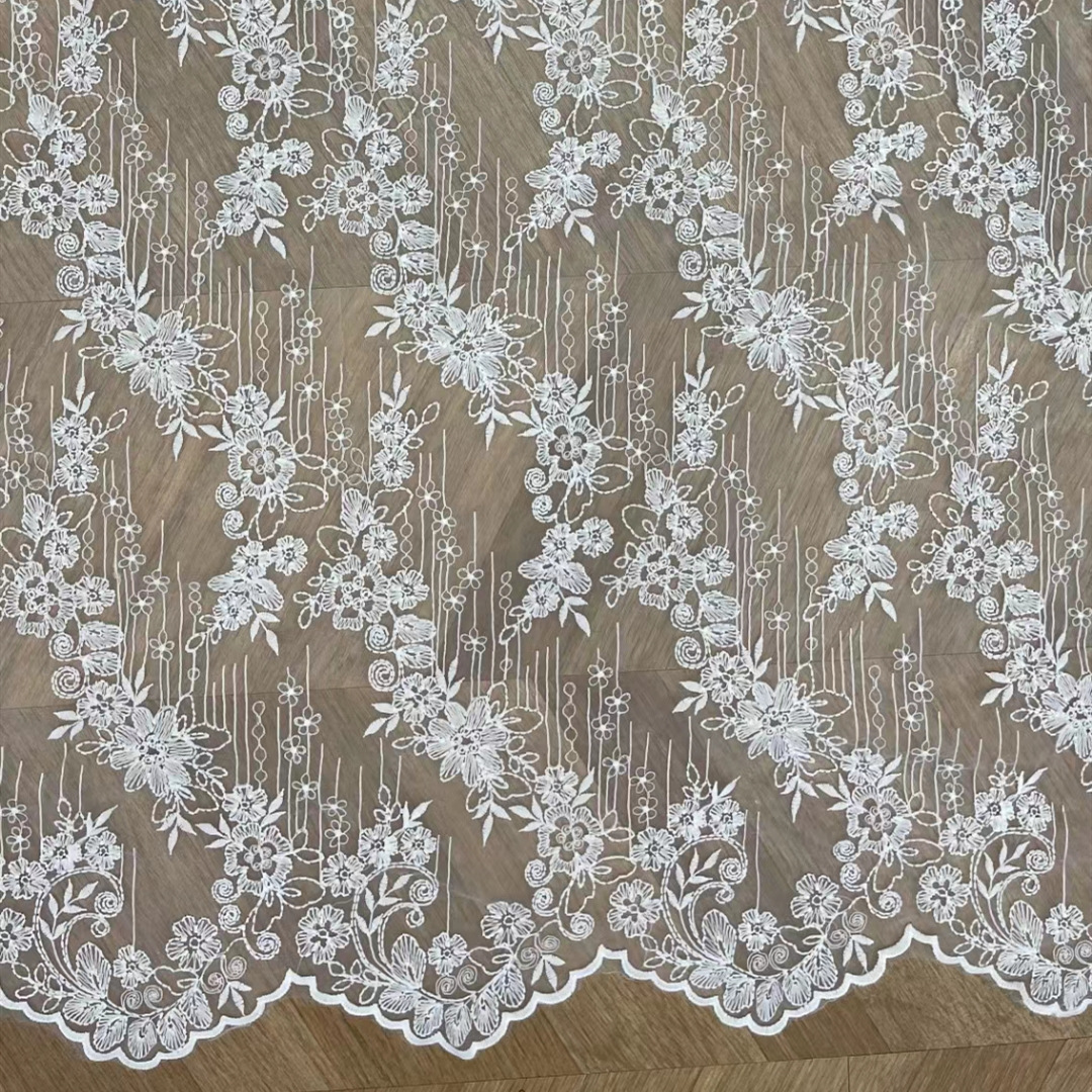 新款水溶牛奶丝网纱刺绣面料高档童装女装连衣裙布艺蕾丝绣花面料