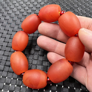 荧光浮盐水蜜蜡鼓型手链二代蜜蜡路路通手链橘红色文玩老蜜蜡手串