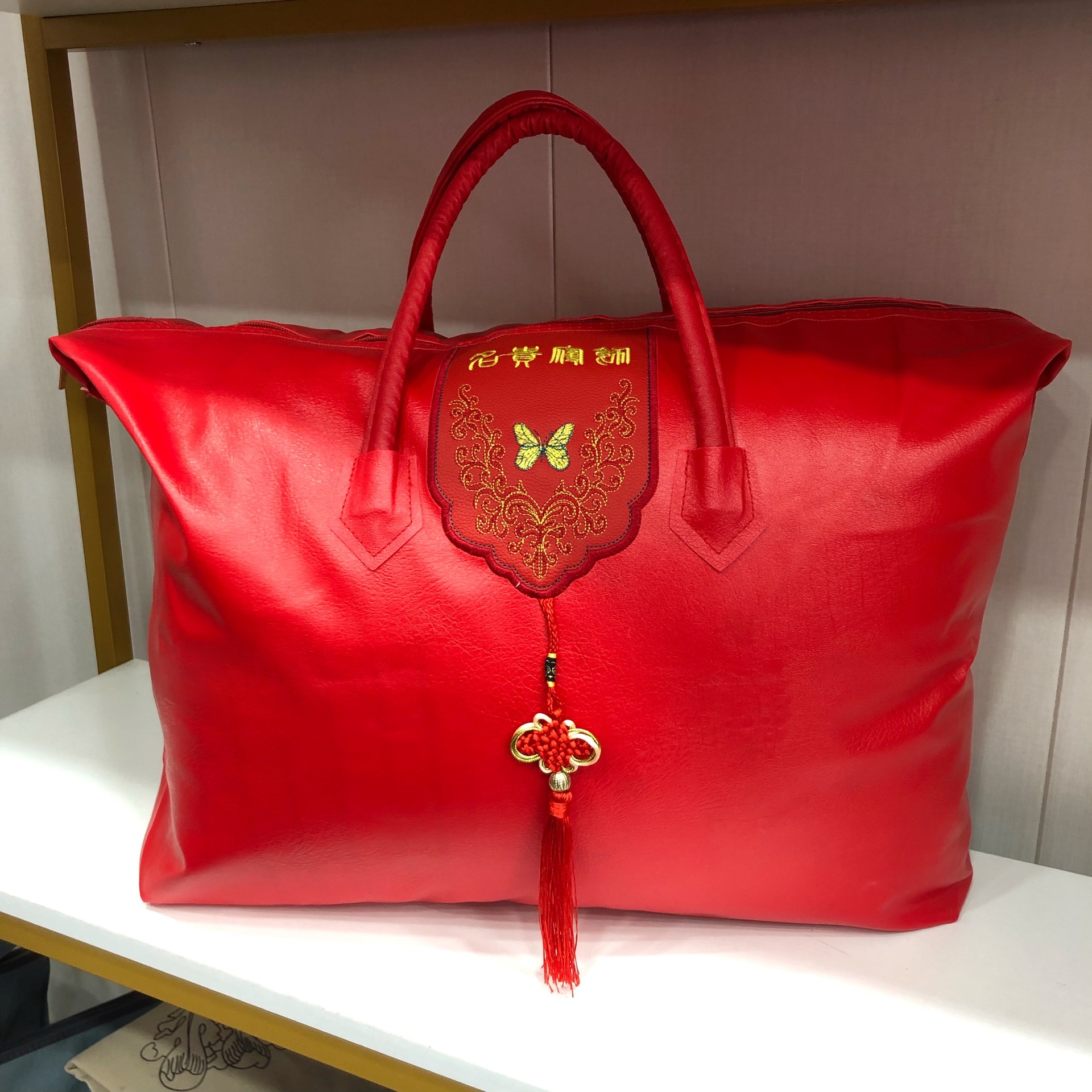 厂家红色皮革元宝袋结婚蚕丝被羽绒被高档礼品手提收纳包装袋现货