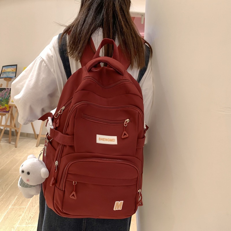 2023 New Solid Color Nylon Schoolbag Female College Student Large Capacity Junior High School Backpack High School Student Computer Backpack