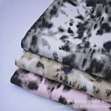 厂家批发双色豹纹牛仔洗水印花面料裤子裙子外套服装箱包鞋帽布料