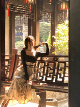 新中式复古显瘦长袖旗袍连衣裙女秋冬设计感气质国风印花拼接长裙