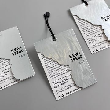 服装吊牌反光镭射幻彩特殊纸挂牌男女潮吊牌ins风新款童装卡牌