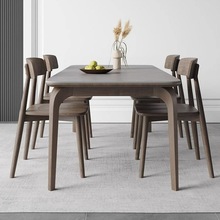北欧岩板餐桌现代简约意式长方形饭桌黑胡桃色轻奢实木餐桌椅组合