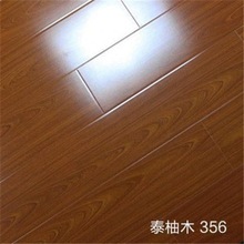 强化复合木地板12mm卧室家用防水光面地板红色地板亮面浮板