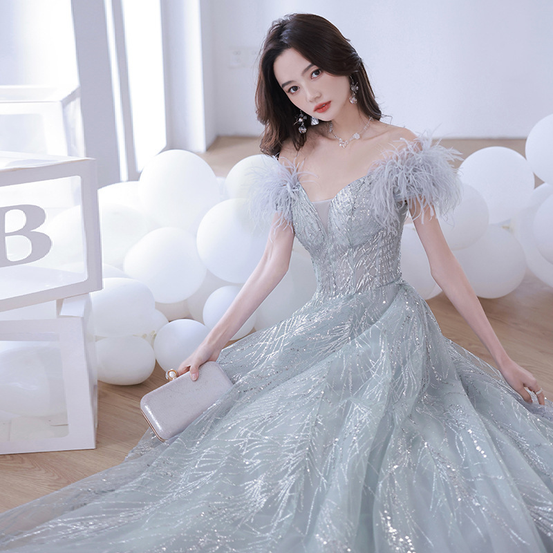 一字肩晚礼服2023春季新款设计感羽毛长裙主持人宴会生日气质礼服