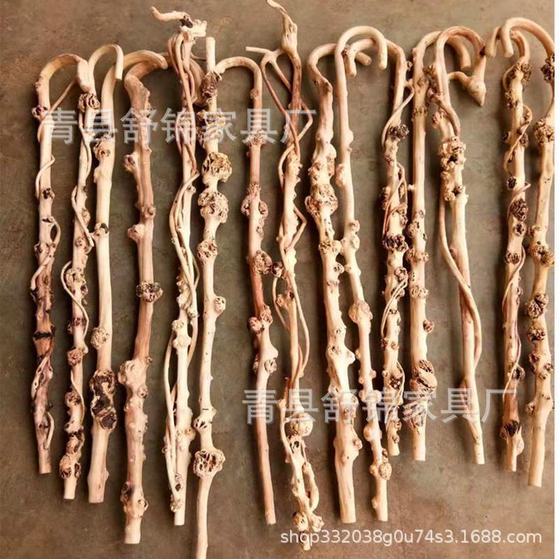 厂家直供云南黑果木拐杖山茶木把手造型手杖留疤木根雕树瘤拐杖