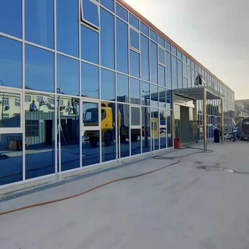 钢结构打包箱房 玻璃幕墙彩钢板房 移动住人办公集装箱活动房定制