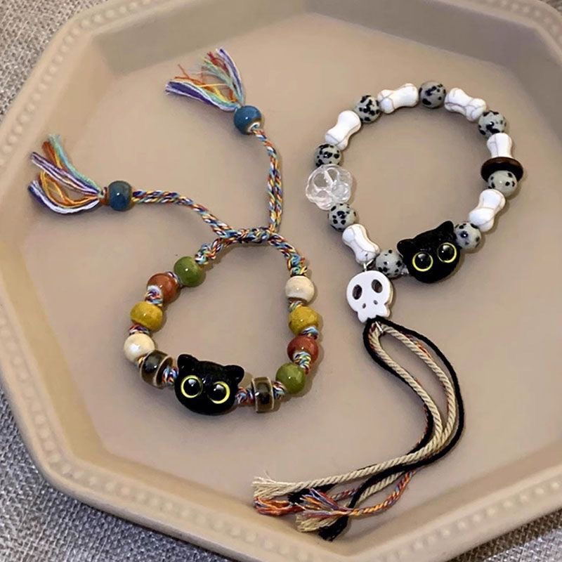 骷髅猫咪陶瓷编织绳手链女小众设计感甜酷中国风流苏彩色手串手饰