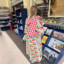 欧美跨境2025新款女时尚卡其色水果翻领气质通勤印花大衣风衣外套