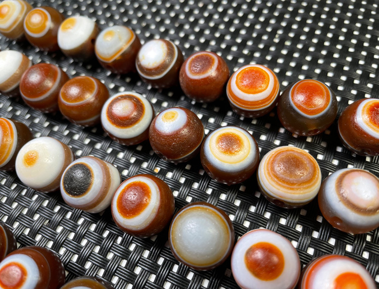 【材质】精品缠丝玛瑙红眼天珠16mm 随机发货示器不同等种种原因,您