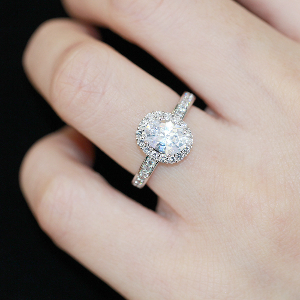 太阳云 韩版韩式精致镶钻椭圆仿真钻戒气质女款时尚百搭订婚戒指