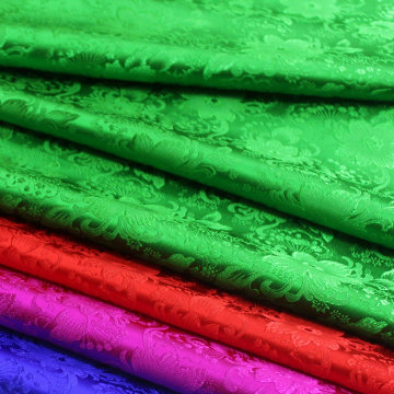 中国风旗袍童装蒙古袍民族服装舞台装饰手工提花织锦缎丝绸面料麻