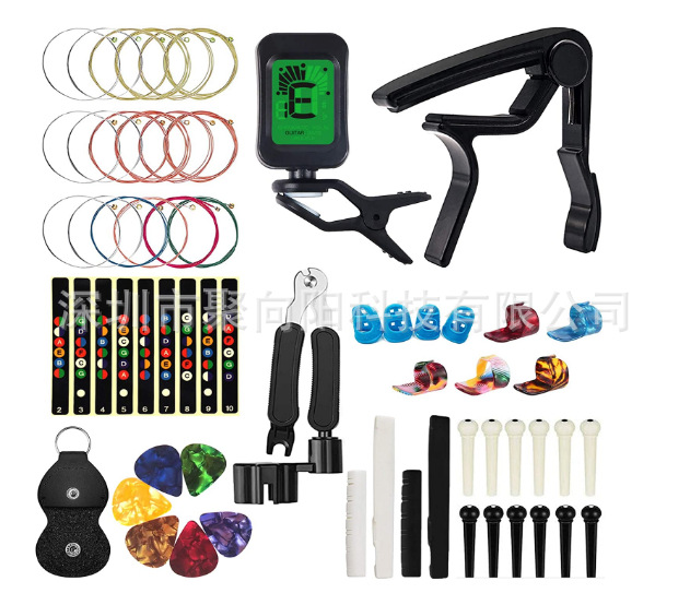 吉他配件套装音阶贴吉他弦调音器变调夹琴枕拨片三合一换弦工具