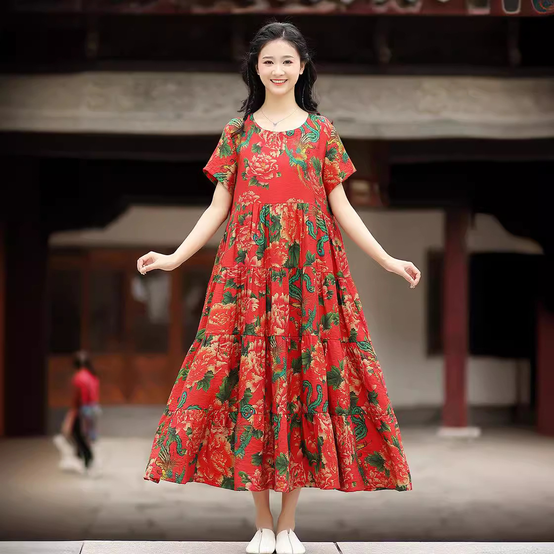 民族风连衣裙女2024夏新款天丝棉印花简约套头宽松拼接大摆长裙