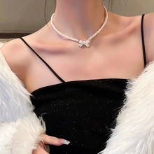蝴蝶结珍珠毛衣链2021年新款潮耳钉女小众设计感高级耳环锁骨链