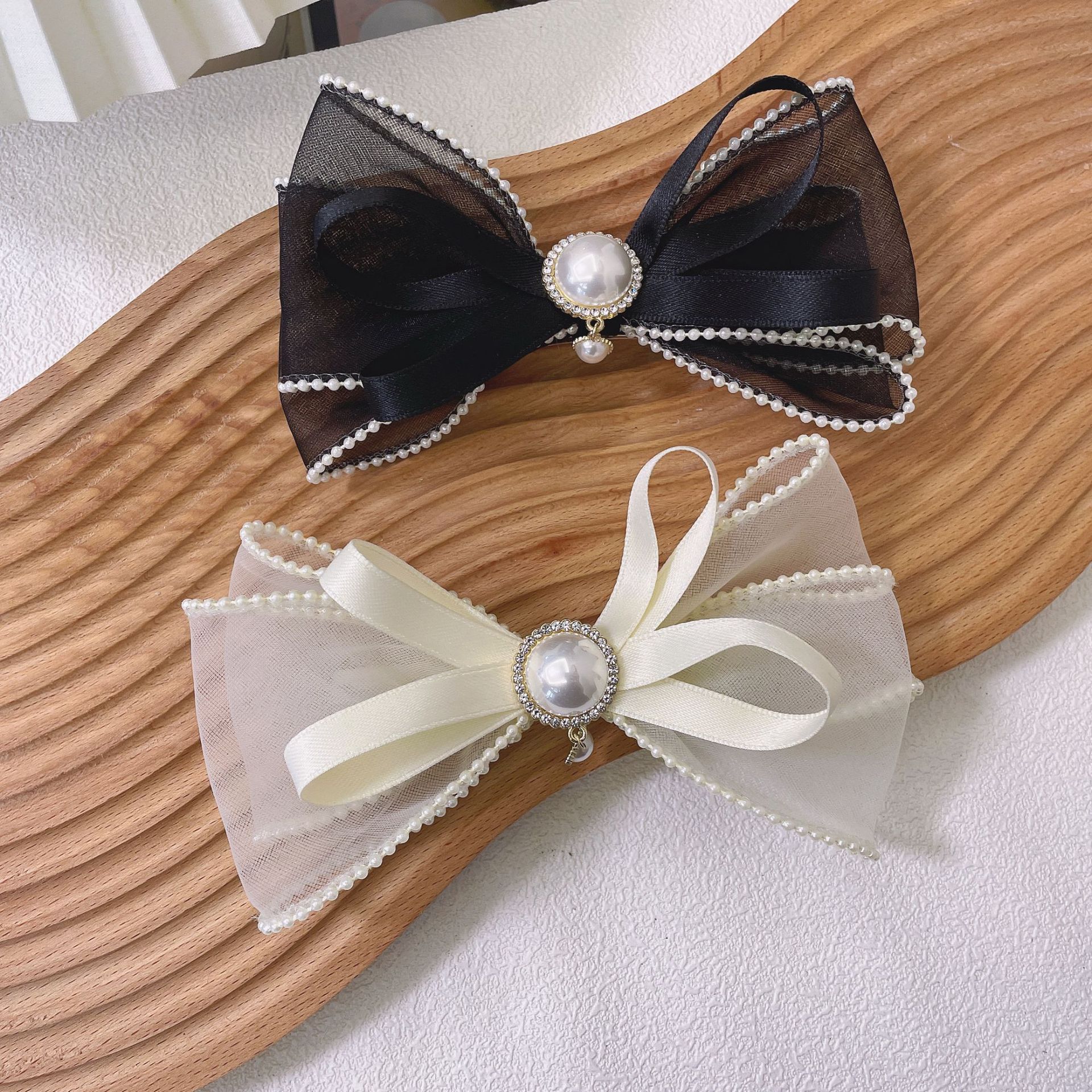 2021年新款珍珠蝴蝶结头饰女流苏弹簧发夹韩式气质少女后脑勺发饰