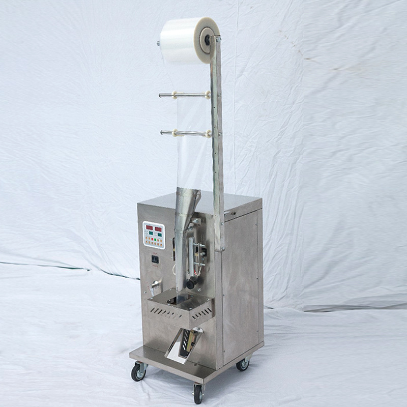 人工投料小型自动包装机 黑芝麻丸花茶打包机 五金配件图钉包装机