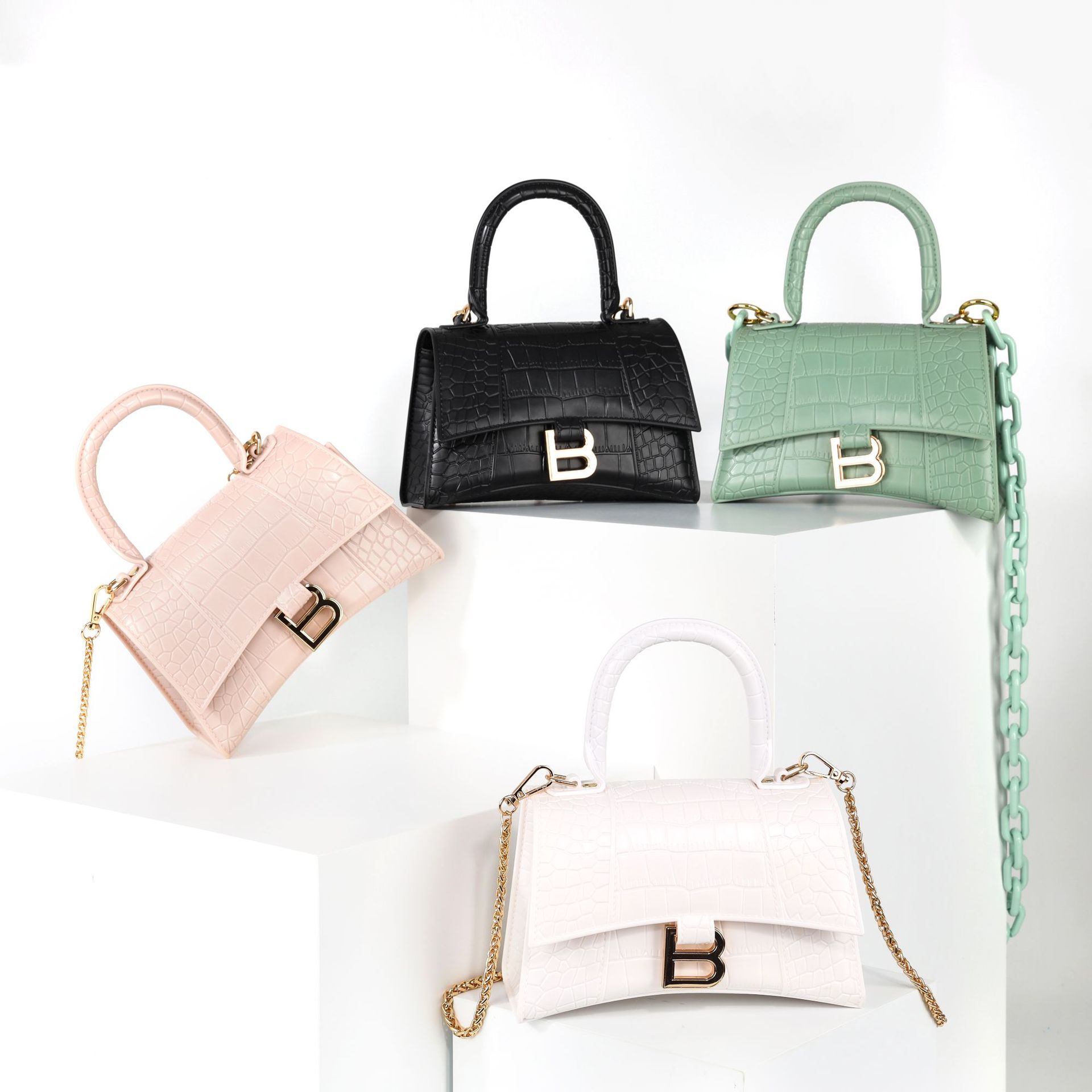 2021秋冬款时尚b家沙漏包小方包高质感半月形斜跨女包轻便手提包