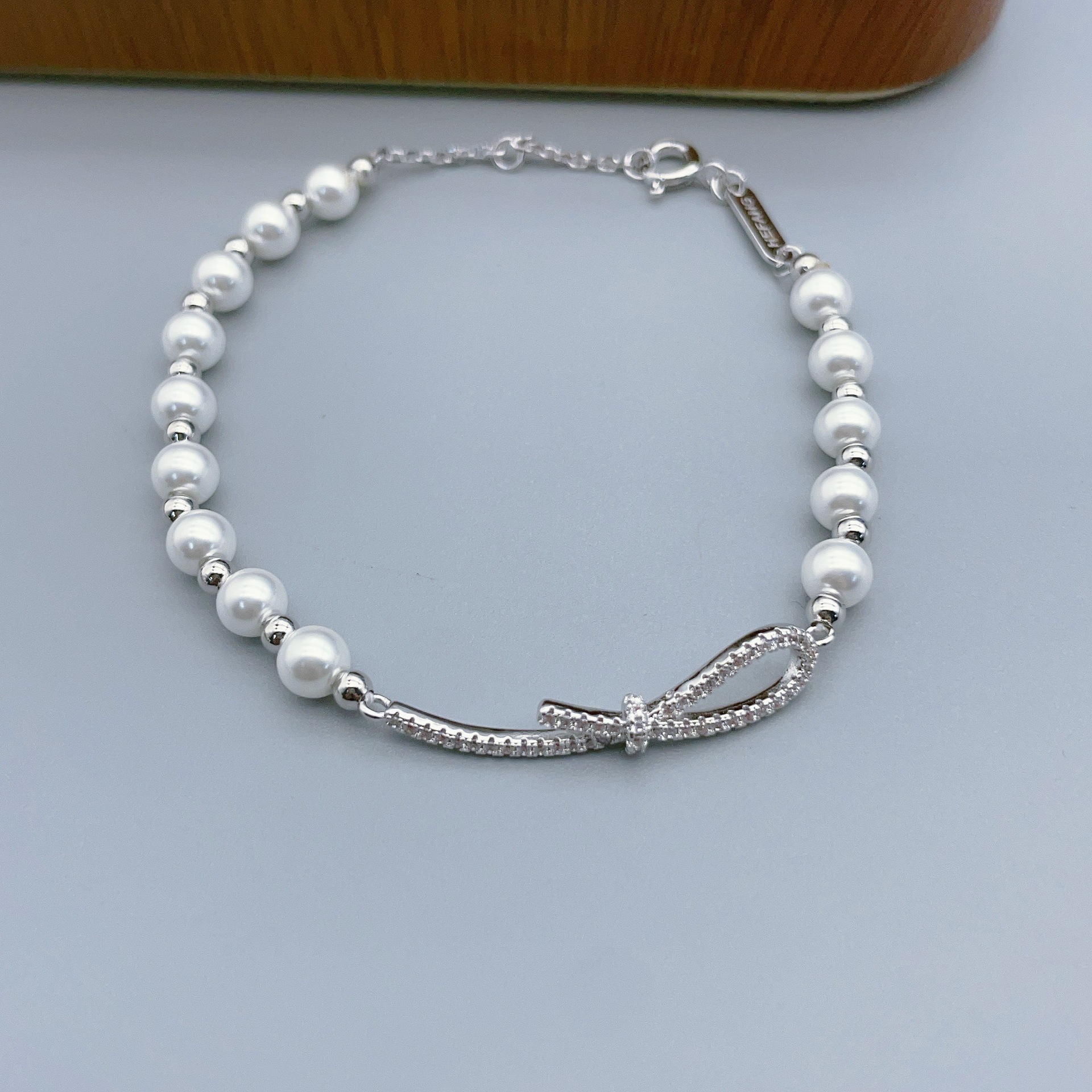 超仙气质珍珠蝴蝶结手链轻奢优雅气质丝带珍珠拼接圆珠手环饰品