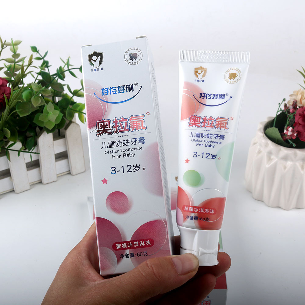 正品奥拉氟儿童牙膏水果味3-12岁防蛀含氟牙膏60g-阿里巴巴