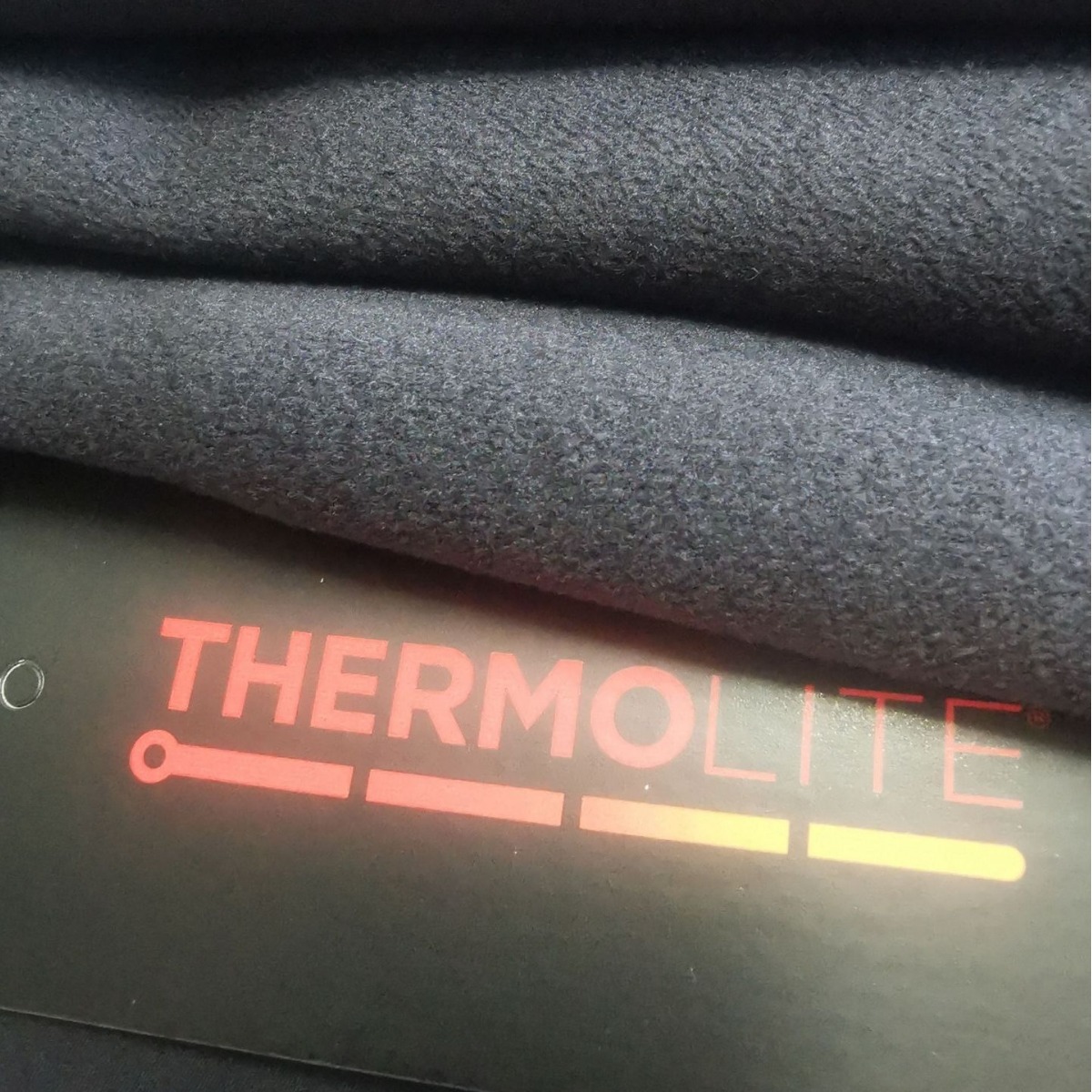 杜邦英威达thermolite吊牌中空保暖软壳防泼水四面弹加绒锦纶面料