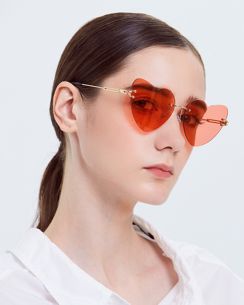 s2039金属无边框粉色桃心太阳镜 欧美爱心墨镜 女士心形眼镜批发-阿里