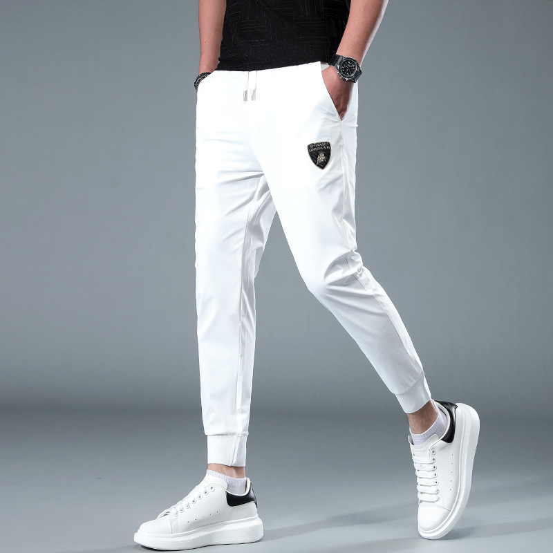 白色冰丝休闲裤男夏季潮流百搭薄款修身小脚裤欧货潮牌运动裤