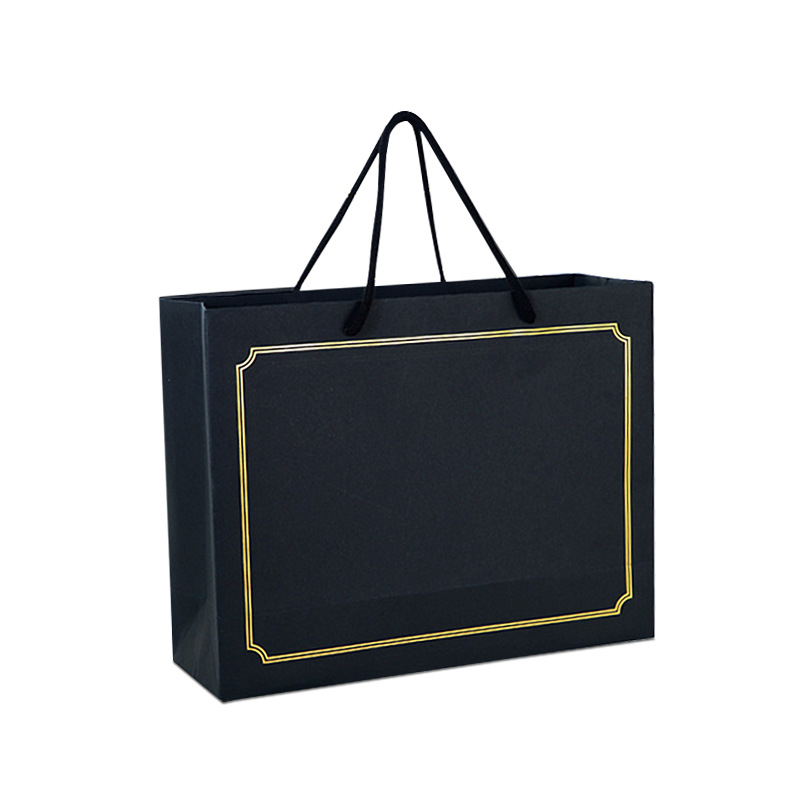 厂家定做 黑卡纸质大号广告烫金黑色纸袋手提袋服装店礼品袋定制
