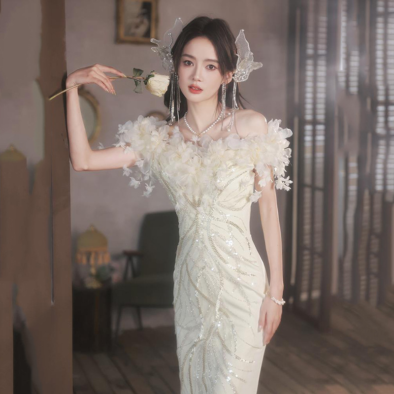 超仙晚礼服裙轻奢小众风范2024新款一字肩鱼尾宴会气质跨境感白色