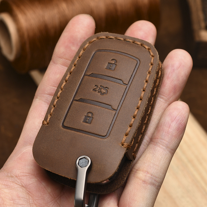 适用于长安cs75钥匙套逸动cs55plus欧尚蓝鲸cs35真皮汽车包扣壳