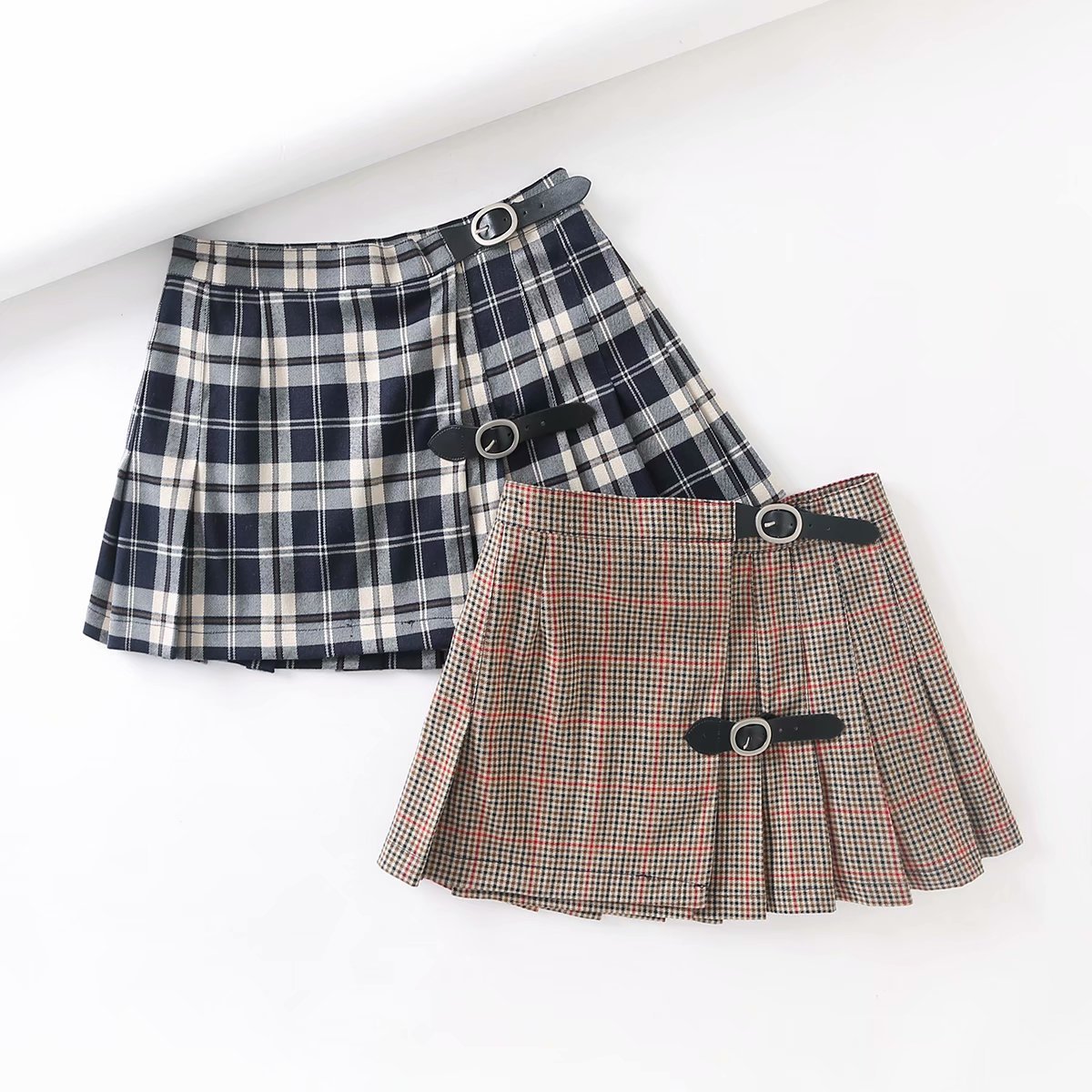 批发2021春新品欧美风女装格子皮带扣可调节百褶半身裙