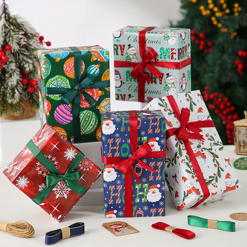新款圣诞节铜版纸包装纸 圣诞老人雪花礼物包装纸麋鹿礼品包装纸