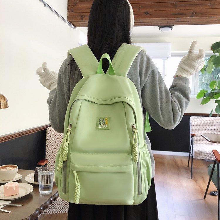 高中生书包女款初中生大容量中学生轻便减负护脊高颜值背包双肩包