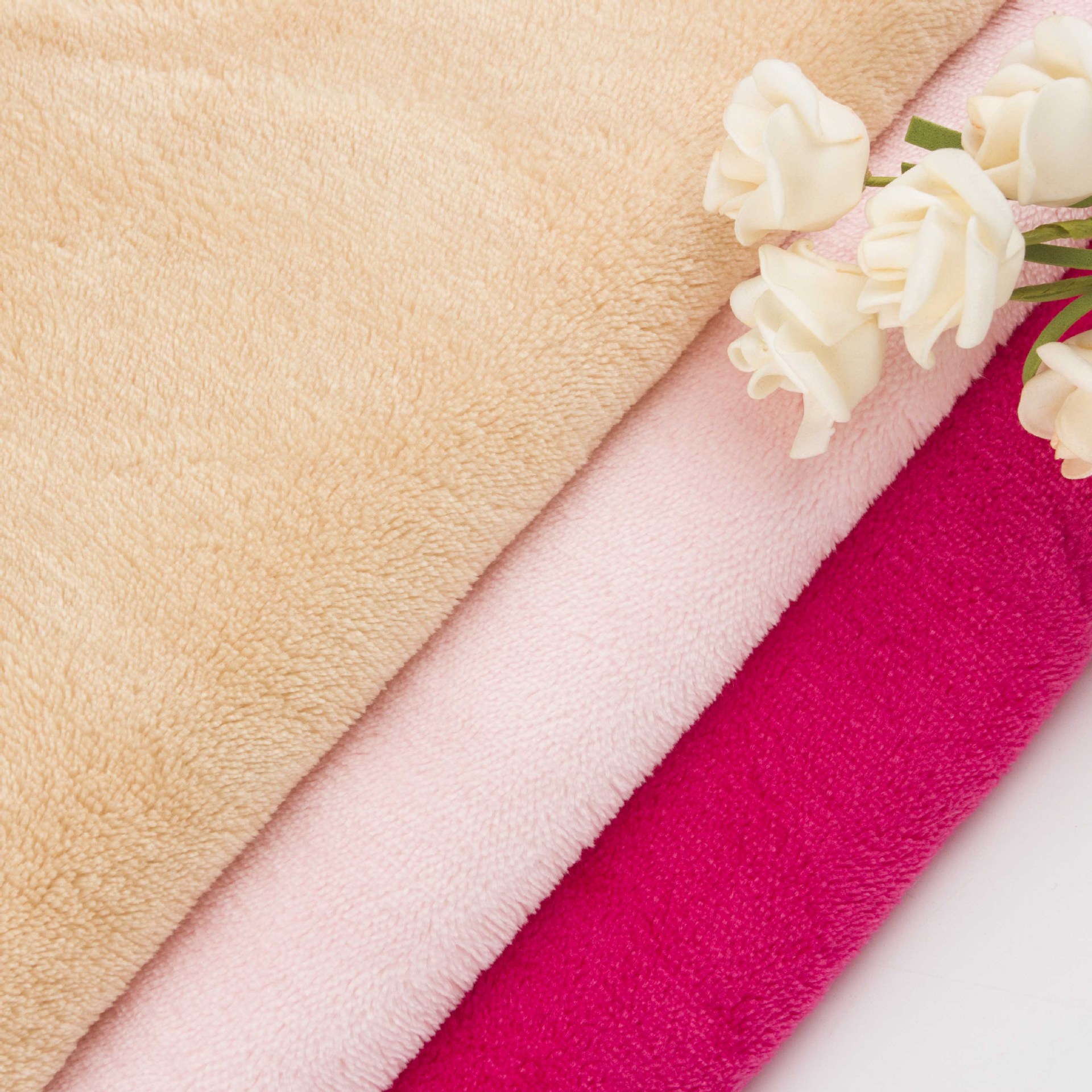 现货素色法兰绒布料单面法兰绒鞋帽服装家纺面料涤纶