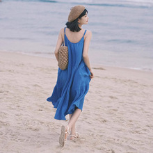 法式海边度假风蓝色吊带连衣裙子女夏季2024新款气质显瘦沙滩长裙