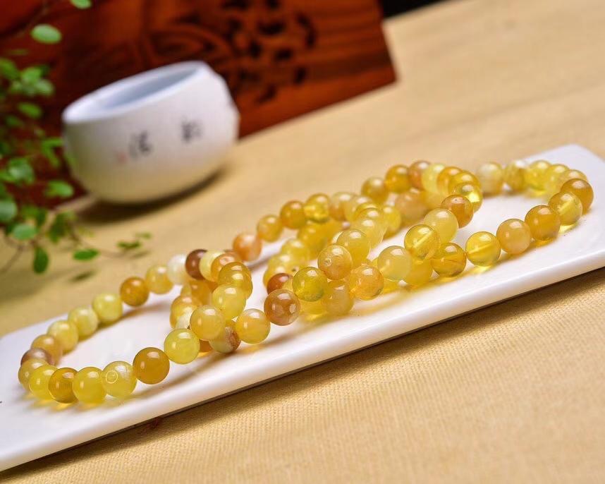 天然黄澳宝圆珠手链6-8毫米 晶体美颜色亮丽送人自留必备-阿里巴巴