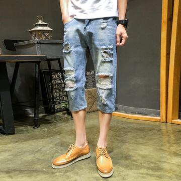 夏季韩版破洞牛仔裤丐版猫须破烂七分裤男士休闲潮流时尚帅气