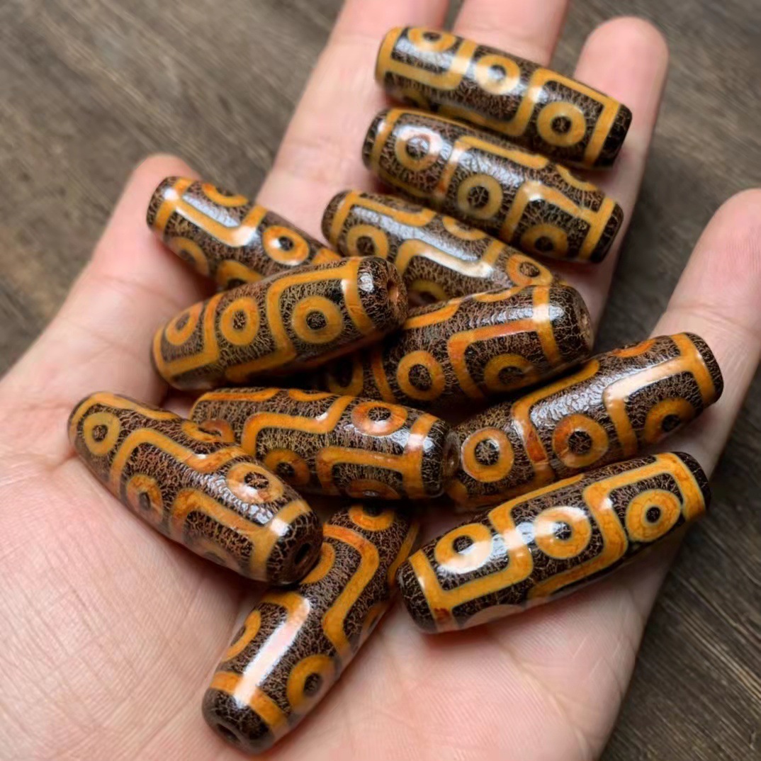 批发玛瑙玉髓藏饰牙黄包浆九眼天珠散珠玛瑙项链吊坠配饰