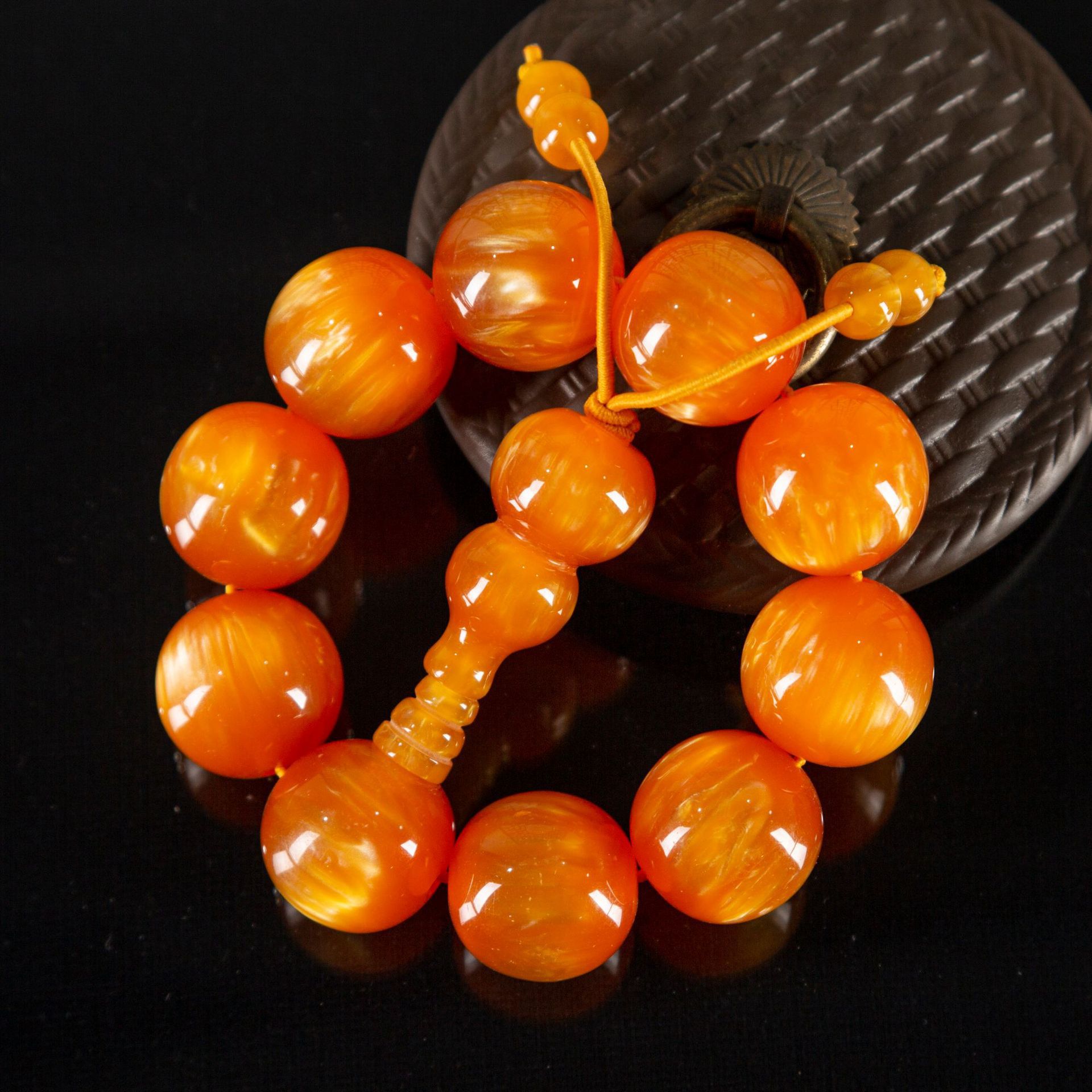 厂家发货仿琥珀棕红珀佛珠手串 批发珠光黄佛塔手串小饰品送礼