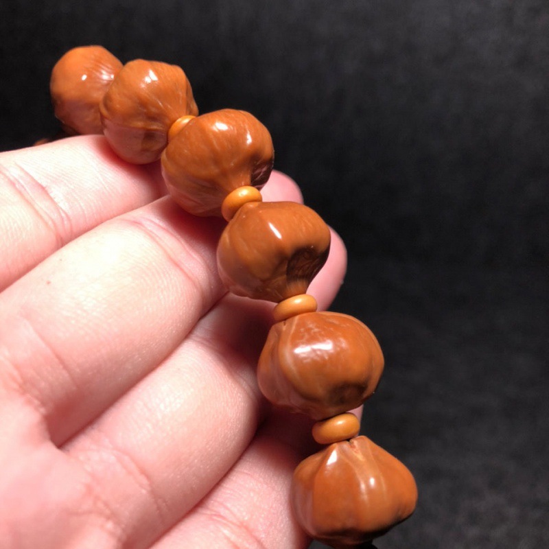 橄榄核尖手串蒜头铁红料胡雕素素串铁速卖通代货厂家直销一件批发